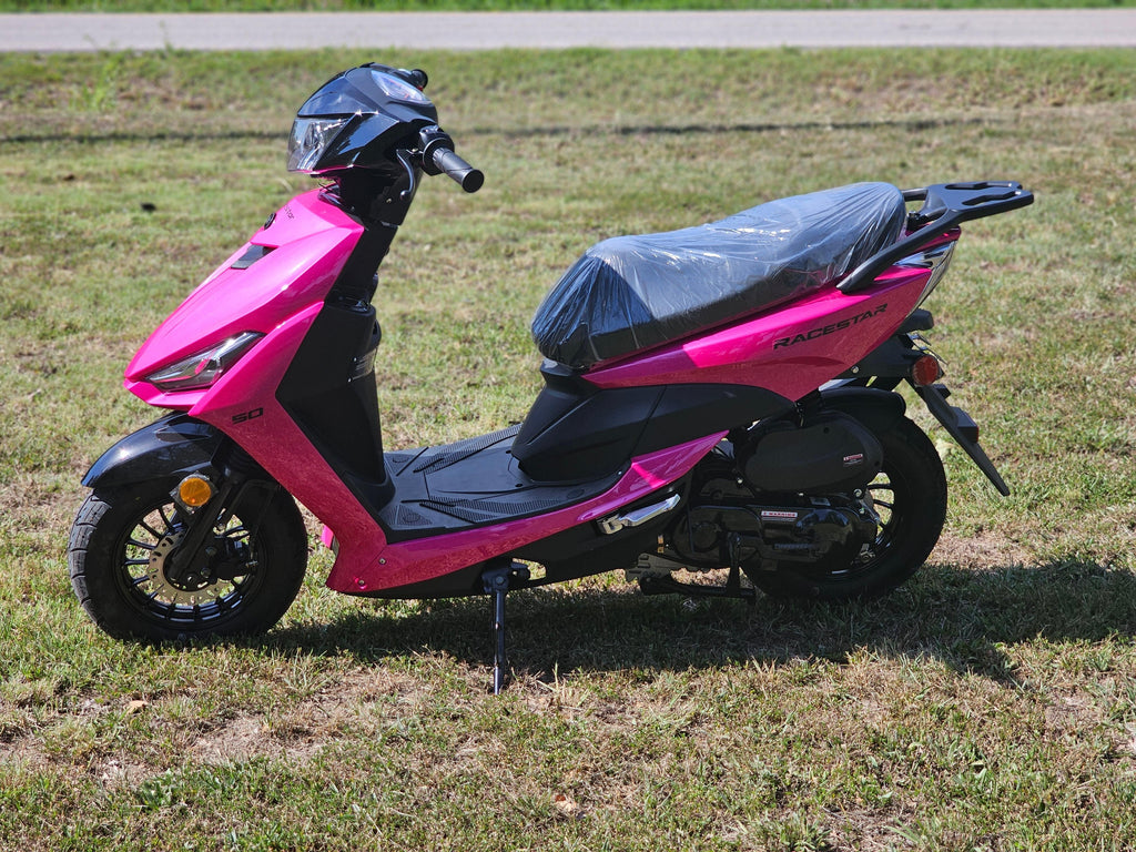 Front view of the RaceStar 50 Scooter in raspberry color, highlighting the LED lights and streamlined design, available at Lee Motorsports